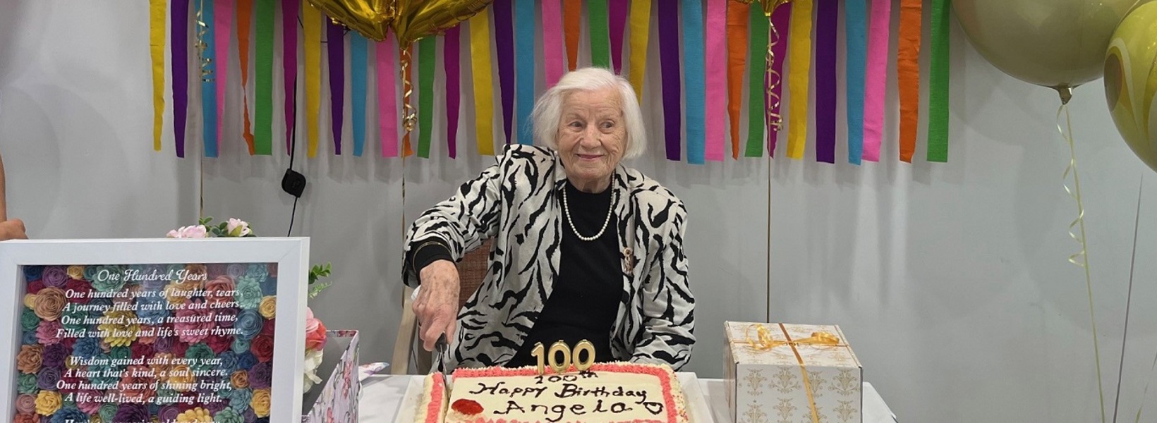 Angela Kucic celebrating her 100th birthday.jpg Angela Kucic celebrating her 100th birthday.jpg