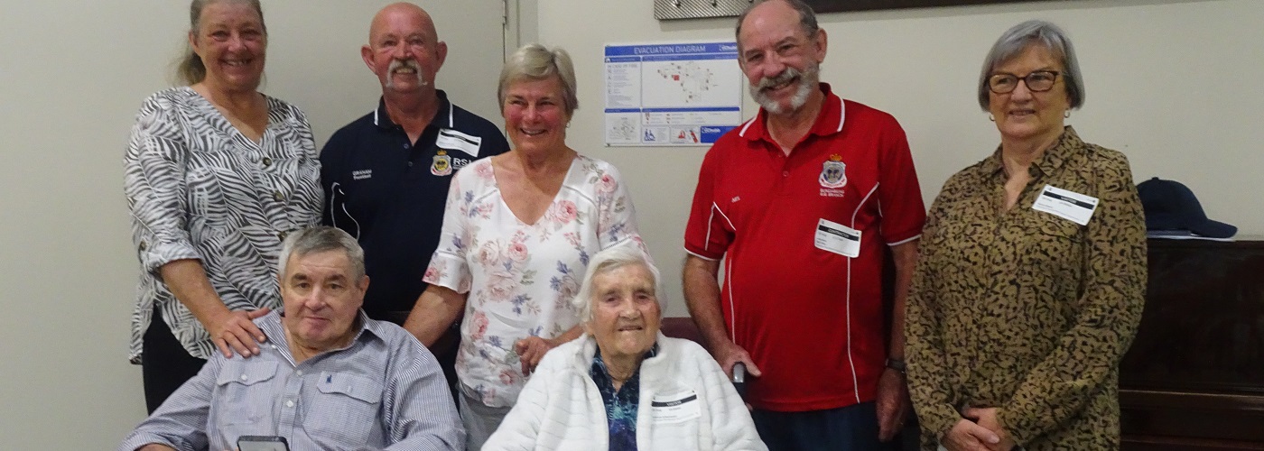 Fairways resident Greg and family with Bundaberg RSL Sub Branch Members Graham and Neil