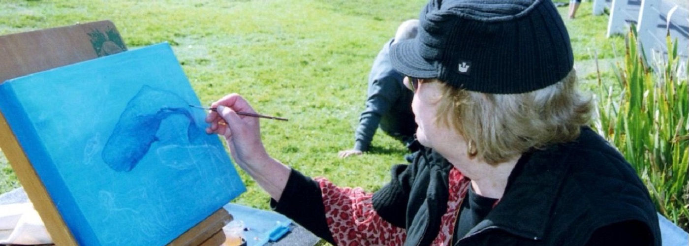 Janice painting on the shore of Norah Heads.jpg