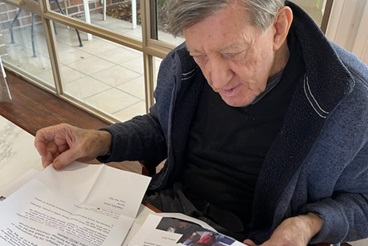 Residents opening their letters_.jpg