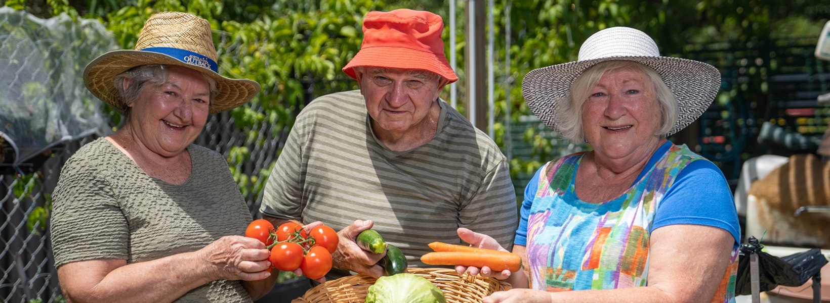 Rowes Bay residents in the community garden Rowes Bay residents in the community garden